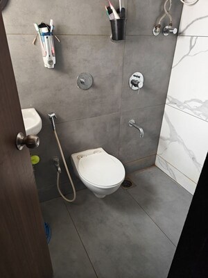 Bathroom in 2 BHK Apartment at Unnati Woods CHS, Kasarvadavali – for Rent