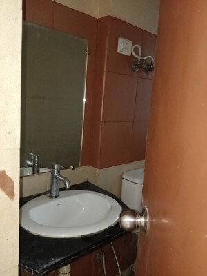 Bathroom in 3 BHK Apartment at Mahagun My Woods, Sector 16c Greater Noida – for Rent