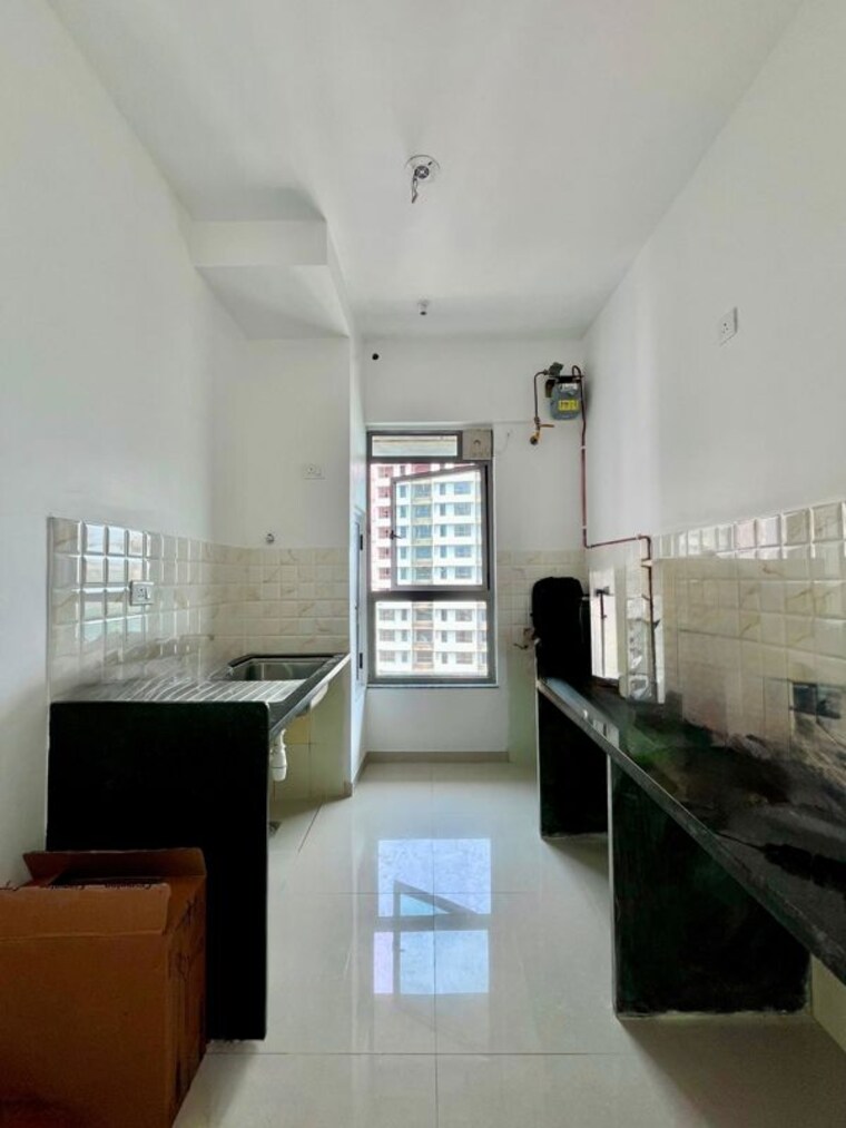 Kitchen, kalpataru-immensa 1 Bedroom 550 Sq.Ft. Apartment In Kolshet Road Thane 10769241