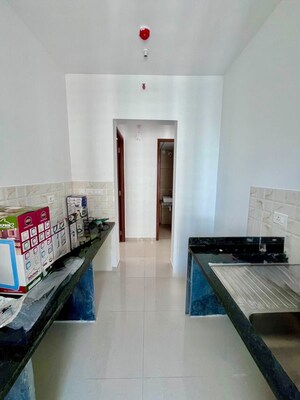 Kitchen in 1 BHK Apartment at Kalpataru Immensa, Kolshet Road – for Sale