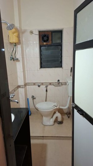 Bathroom in 2 BHK Apartment at Dheeraj Darshan, Jogeshwari East – for Rent
