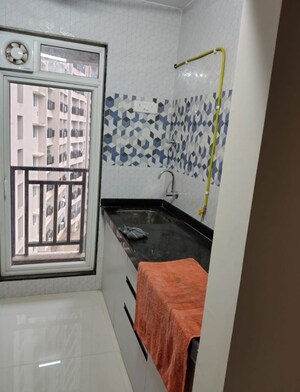 Kitchen in 1 BHK Apartment at Raunak Bliss, Ghodbunder Road – for Rent