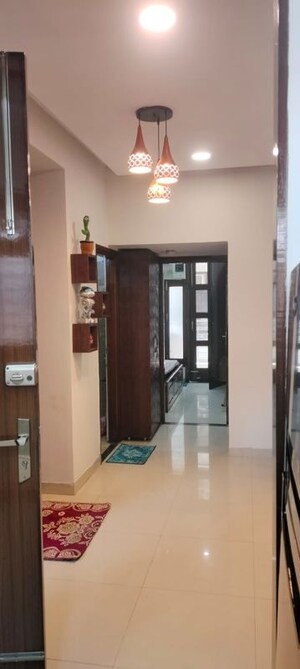 Living Room in 2 BHK Apartment at Urban Vatika, Dhakoli – for Rent