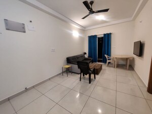 Living Room in 1 BHK Apartment at Prestige Song Of The South, Yelenahalli – for Rent