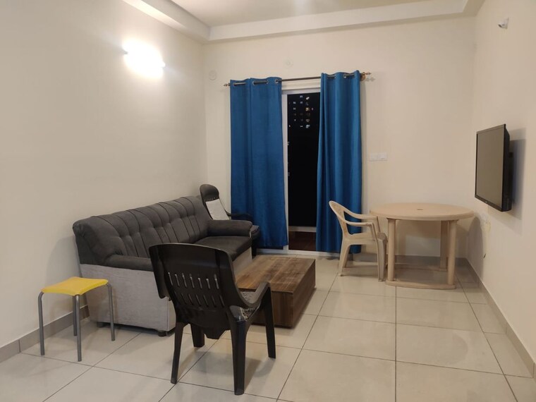 Living Room, prestige-song-of-the-south 1 Bedroom 644 Sq.Ft. Apartment In Yelenahalli Bangalore 10769024