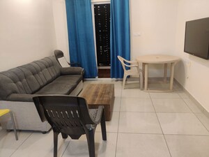 Living Room in 1 BHK Apartment at Prestige Song Of The South, Yelenahalli – for Rent