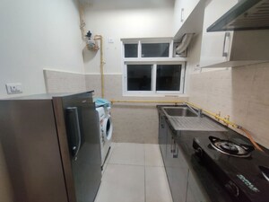 Kitchen in 1 BHK Apartment at Prestige Song Of The South, Yelenahalli – for Rent