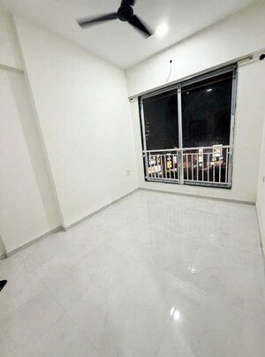 Room in 2 BHK Apartment at Swapnalok Towers, Malad East – for Rent