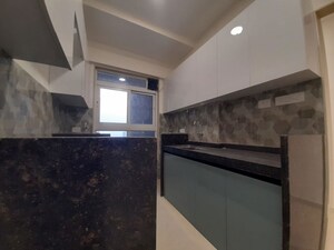Kitchen in 2 BHK Apartment at Group Satellite Elegance, Goregaon East – for Rent