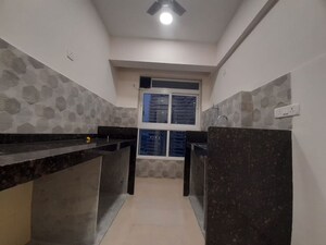 Kitchen in 1 BHK Apartment at Group Satellite Elegance, Goregaon East – for Rent