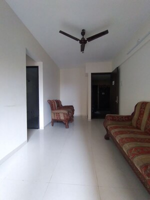 Living Room in 1 BHK Apartment at Sunshine Willows, Ghansoli – for Rent