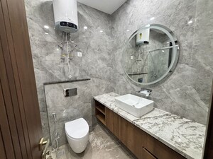 Bathroom in 4 BHK Builder Floor at Shanti Kunj – for Rent