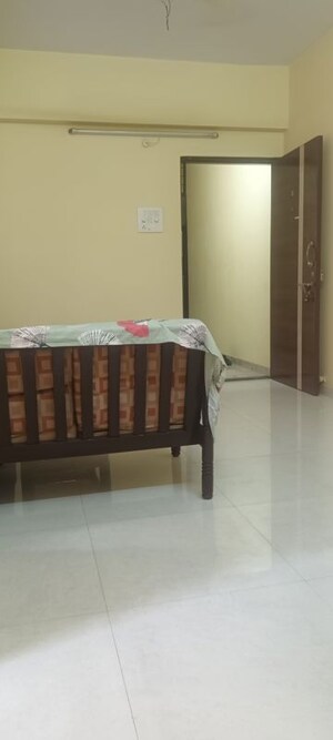 Living Room in 1 BHK Apartment at Sunshine Willows, Ghansoli – for Rent