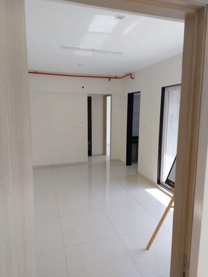 Room in 2 BHK Apartment at Tricity Eros, Kharghar – for Sale