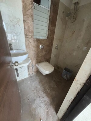 Bathroom in 1.5 BHK Apartment at Ava Guru Dwarka, Dahisar East – for Rent