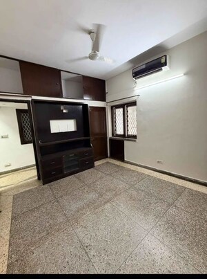 Bedroom in 4 BHK Apartment at Sarvodaya Enclave – for Rent