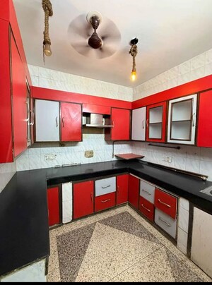 Kitchen in 4 BHK Apartment at Sarvodaya Enclave – for Rent