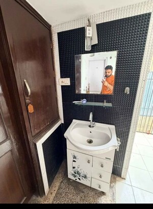 Bathroom in 4 BHK Apartment at Sarvodaya Enclave – for Rent