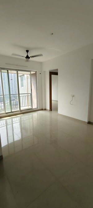 Living Room in 2 BHK Apartment at Tanvi Eminence, Mira Road – for Rent