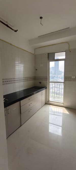 Kitchen in 2 BHK Apartment at Tanvi Eminence, Mira Road – for Rent