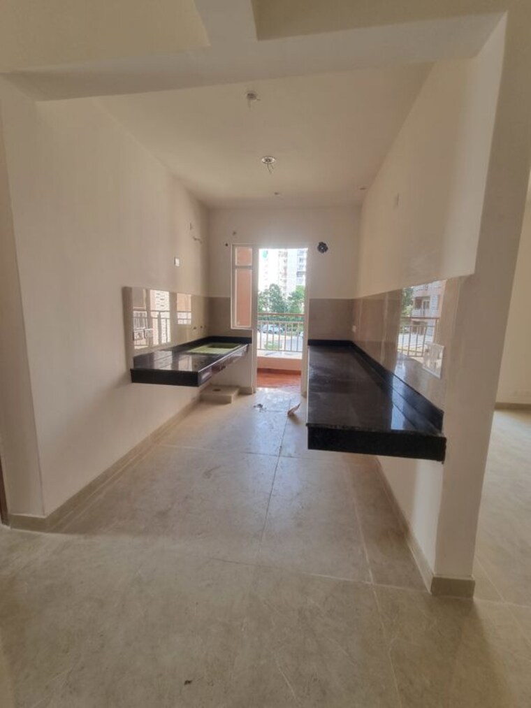 Kitchen, rishita-mulberry-heights 2 Bedroom 1323 Sq.Ft. Apartment In Sushant Golf City Lucknow 10769918