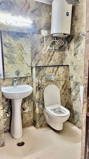 Bathroom in 3 BHK Builder Floor at Freedom Fighters Enclave – for Sale