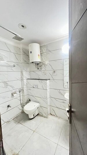 Bathroom in 3 BHK Builder Floor at Freedom Fighters Enclave – for Sale