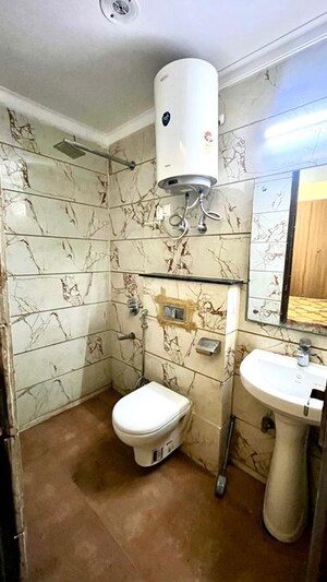 Bathroom in 3 BHK Builder Floor at Freedom Fighters Enclave – for Sale