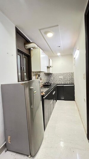 Kitchen in 3 BHK Builder Floor at Freedom Fighters Enclave – for Sale