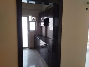 Kitchen in 3 BHK Apartment at VVIP Homes, Gaur City 2 – for Rent