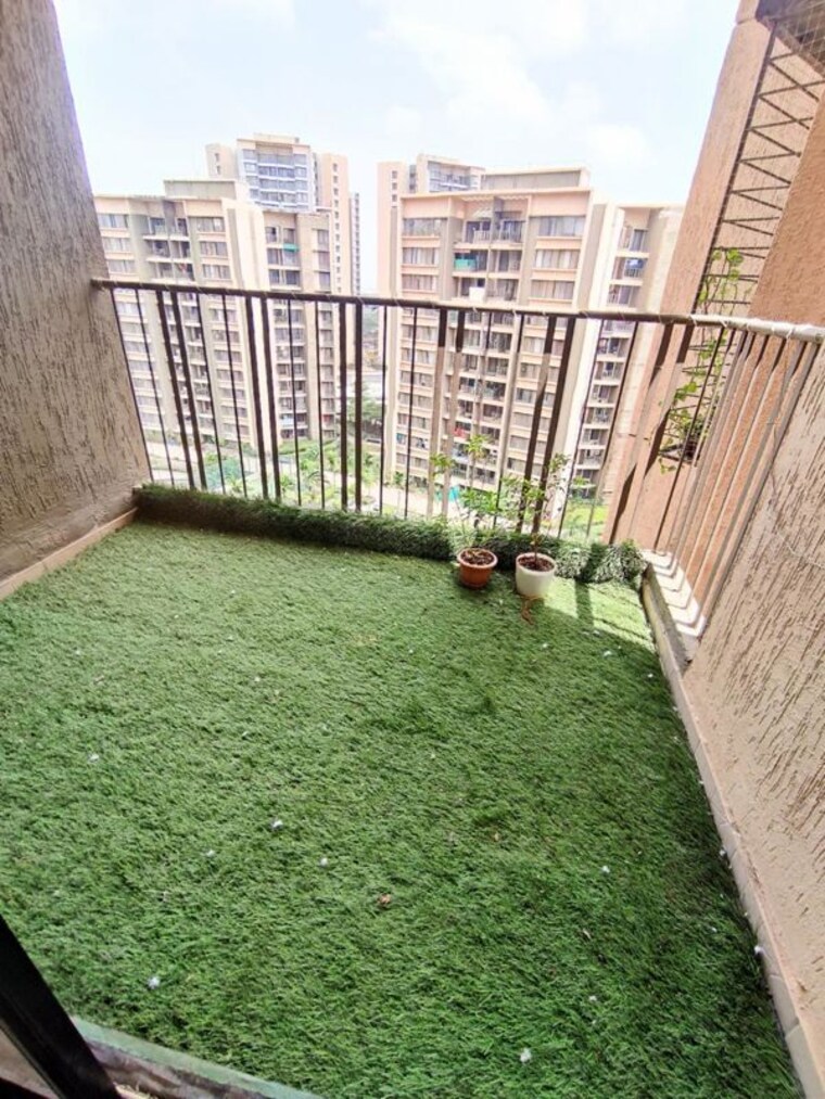 Balcony, pride-world-city-brooklyn 2 Bedroom 1045 Sq.Ft. Apartment In Charholi Budruk Pune 10770068