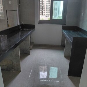 Kitchen in 2 BHK Apartment at Uttam Cottage CHS, Malad West – for Rent