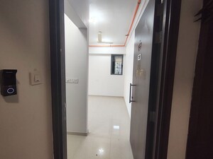 Building Lobby in 1.5 BHK Apartment at Kalpataru Elitus, Mulund West – for Rent