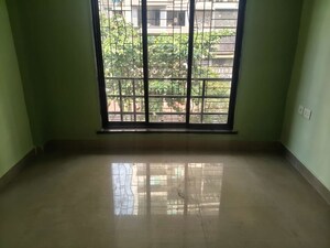 Room in 2 BHK Apartment at Suncity Srushti CHS, Nerul Sector 27 – for Rent