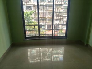 Room in 2 BHK Apartment at Suncity Srushti CHS, Nerul Sector 27 – for Rent
