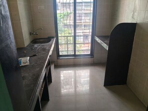 Kitchen in 2 BHK Apartment at Suncity Srushti CHS, Nerul Sector 27 – for Rent