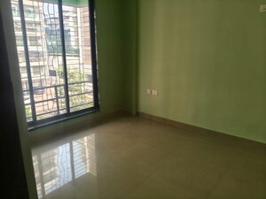 Room in 2 BHK Apartment at Suncity Srushti CHS, Nerul Sector 27 – for Rent