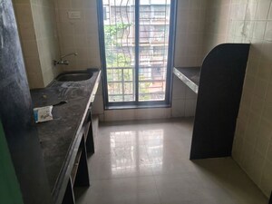 Kitchen in 2 BHK Apartment at Suncity Srushti CHS, Nerul Sector 27 – for Rent
