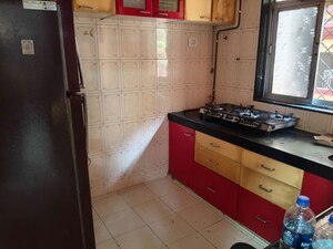 Kitchen in 2 BHK Apartment at Sai Kutir CHS Nerul, Nerul Sector 21 – for Rent