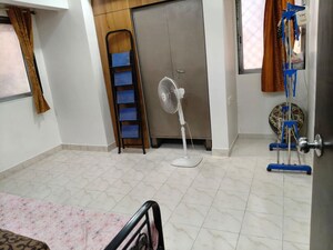 Bedroom in 2 BHK Apartment at Sai Kutir CHS Nerul, Nerul Sector 21 – for Rent