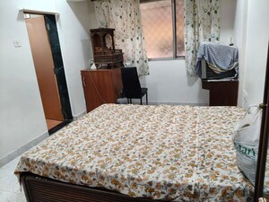 Bedroom in 2 BHK Apartment at Sai Kutir CHS Nerul, Nerul Sector 21 – for Rent
