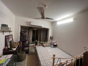 Bedroom in 2 BHK Apartment at Mandar Apartments, Andheri West – for Rent