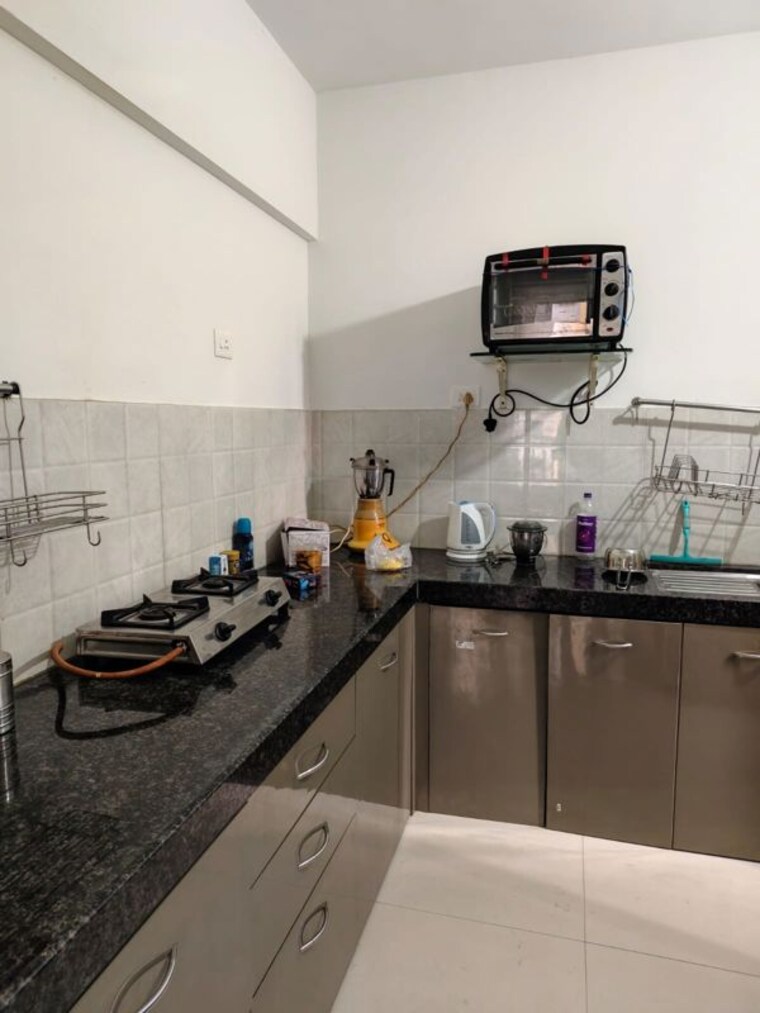 Kitchen, shapoorji-pallonji-joyville-hinjewadi 2 Bedroom 592 Sq.Ft. Apartment In Hinjewadi Pune 10770242