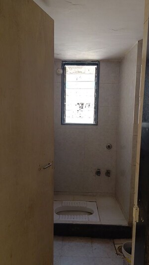 Bathroom in 1 BHK Apartment at Navkar Building, Nalasopara West – for Rent
