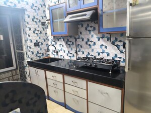 Kitchen in 2 BHK Apartment at Harbour Court, Nerul Sector 19a – for Rent