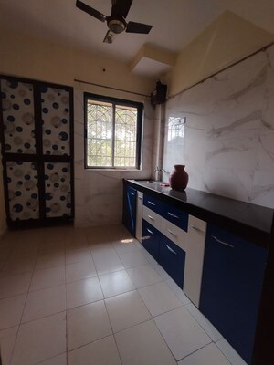 Kitchen in 1 BHK Apartment at Vijay Nagari Annex, Waghbil – for Rent