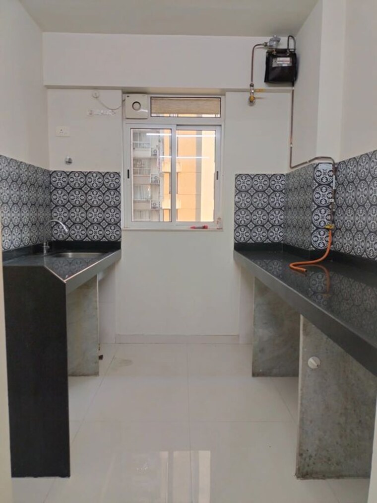 Kitchen, lodha-amara 1 Bedroom 453 Sq.Ft. Apartment In Kolshet Road Thane 10770412
