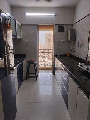 Kitchen in 2 BHK Apartment at Rosa Oasis, Thane West – for Rent