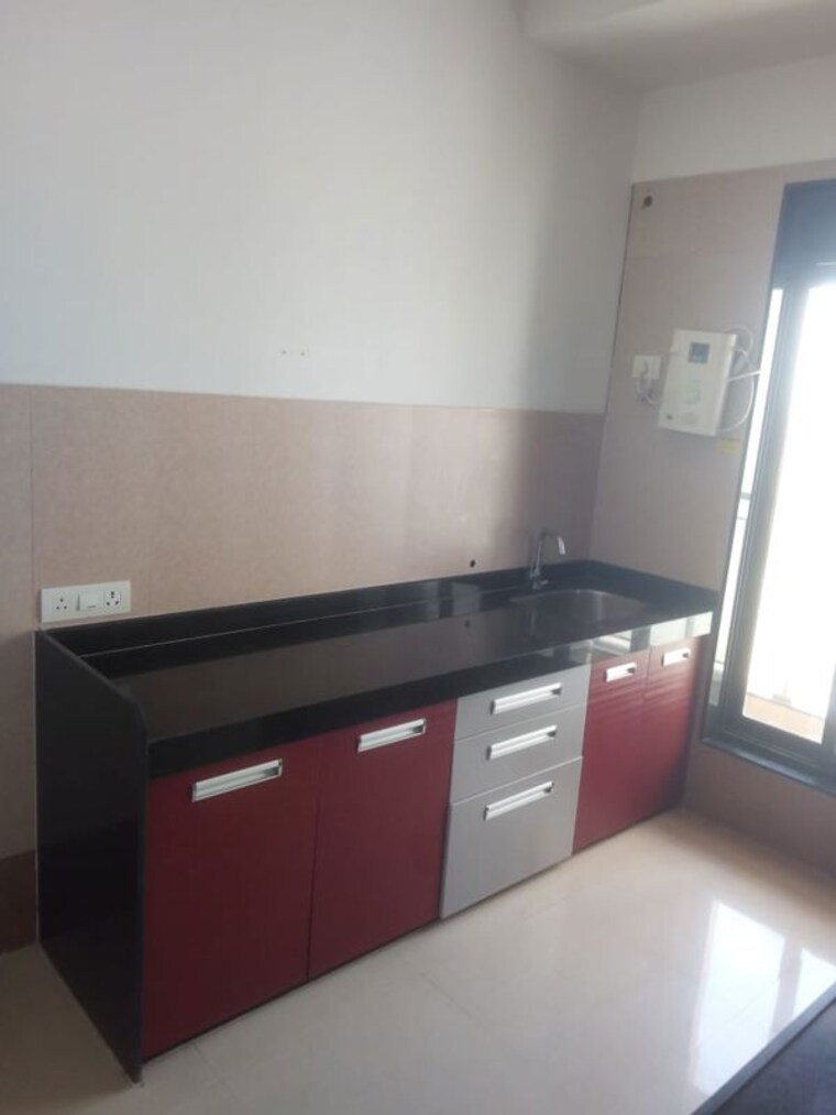 Kitchen, rustomjee-elanza 2 Bedroom 1100 Sq.Ft. Apartment In Malad West Mumbai 10770479