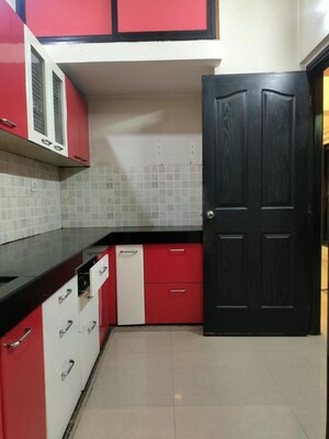Kitchen in 1 BHK Apartment at Lalani Residency, Kavesar – for Sale
